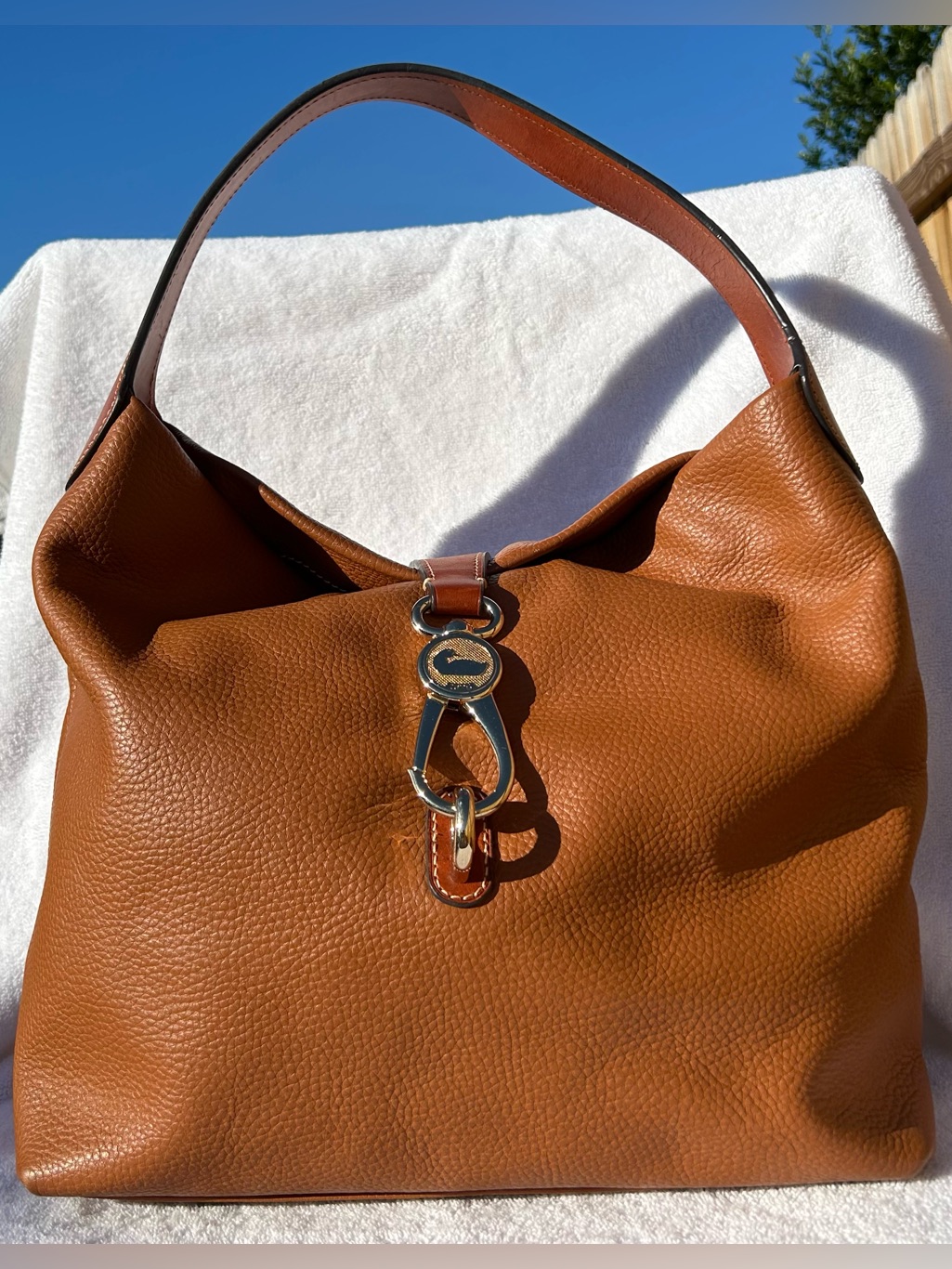 Dooney & Bourke Lucca Leather Logo-Lock Hobo Handbag In The Color Caramel